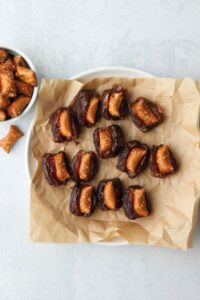 The dates have been stuffed with peanut butter pretzels.