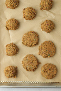 The lentil mixture is placed evenly into 12 balls onto a cookie sheet and flattened.