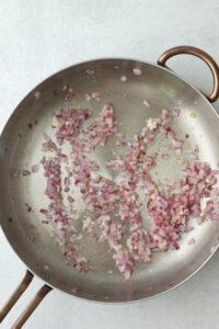 Garlic has been added to the pan.