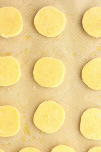 The sliced polenta on a baking sheet.
