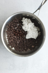 All of the ingredients for the ganache in a sauce pan.