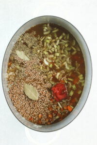 All of the ingredients have been added to the stockpot.