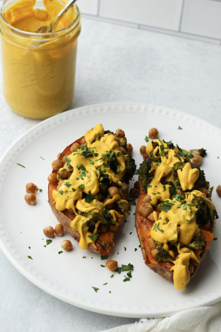 Broccoli and Chickpea Stuffed Sweet Potatoes with Cashew Crema