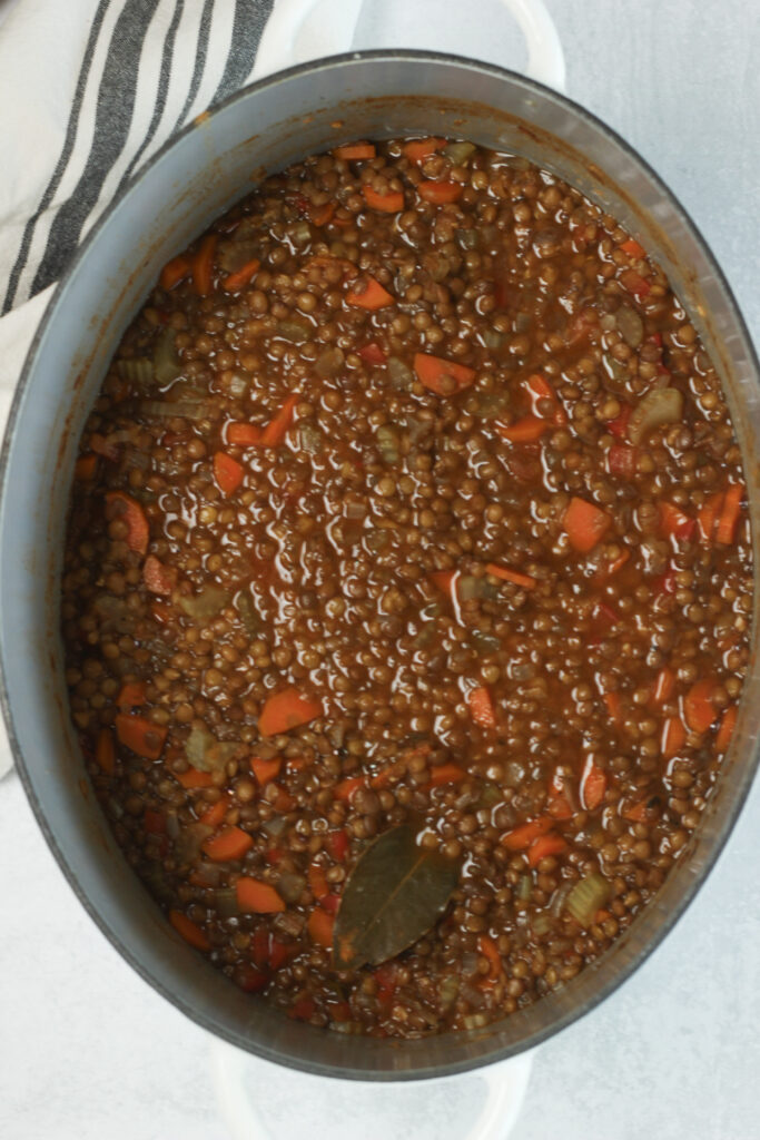 The cooked soup in a stockpot.