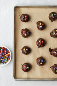 The balls have been topped with rainbow chocolate chips.