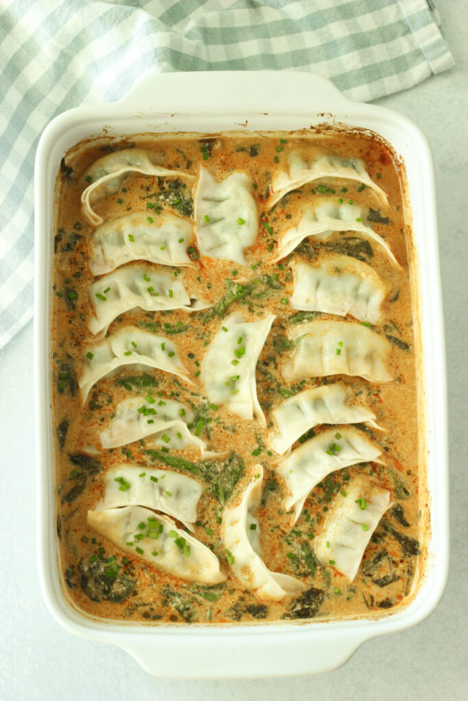 The finished viral dumpling bake in a casserole dish.