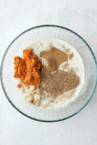 The wet ingredients in a glass bowl.
