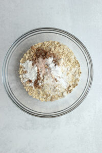 The dry ingredients in a medium glass bowl.
