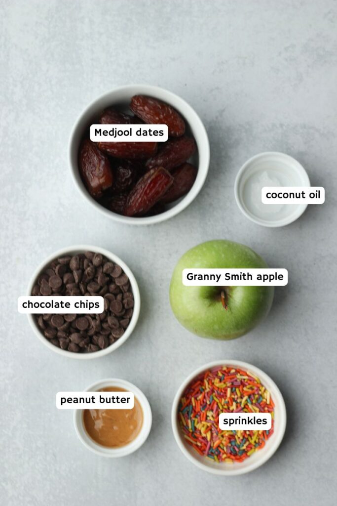 All of the ingredients needed to make this date caramel apple.