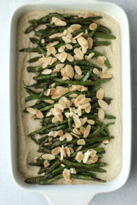 Just added the green beans and almonds to the top of the bean puree.