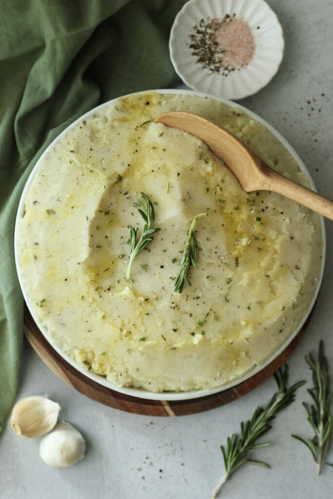 An up-close picture of the mashed potatoes in a dish.