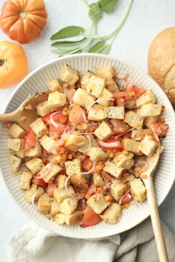 An up close picture of the panzanella salad in a large bowl.