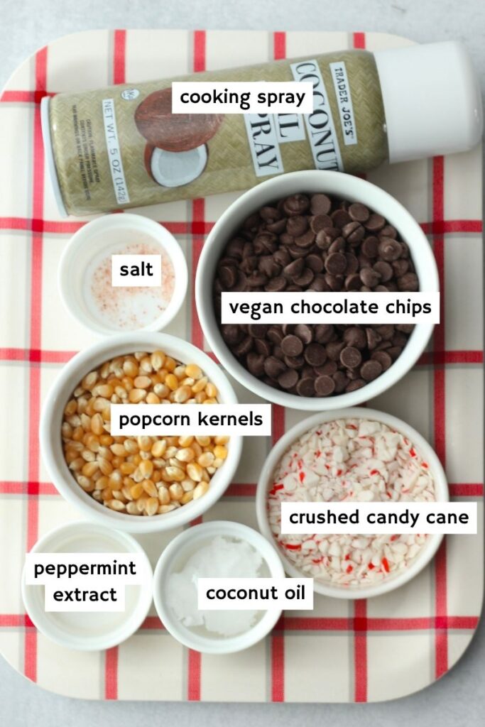 All of the ingredients needed to make this chocolate peppermint popcorn.