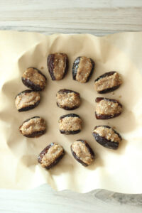 The dates have been stuffed with the dough.