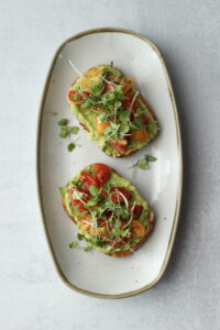 Last, microgreens and crunchy onion chili oil were placed on top.