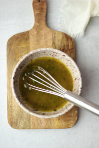 The ingredients have been added to a small bowl and whisked.