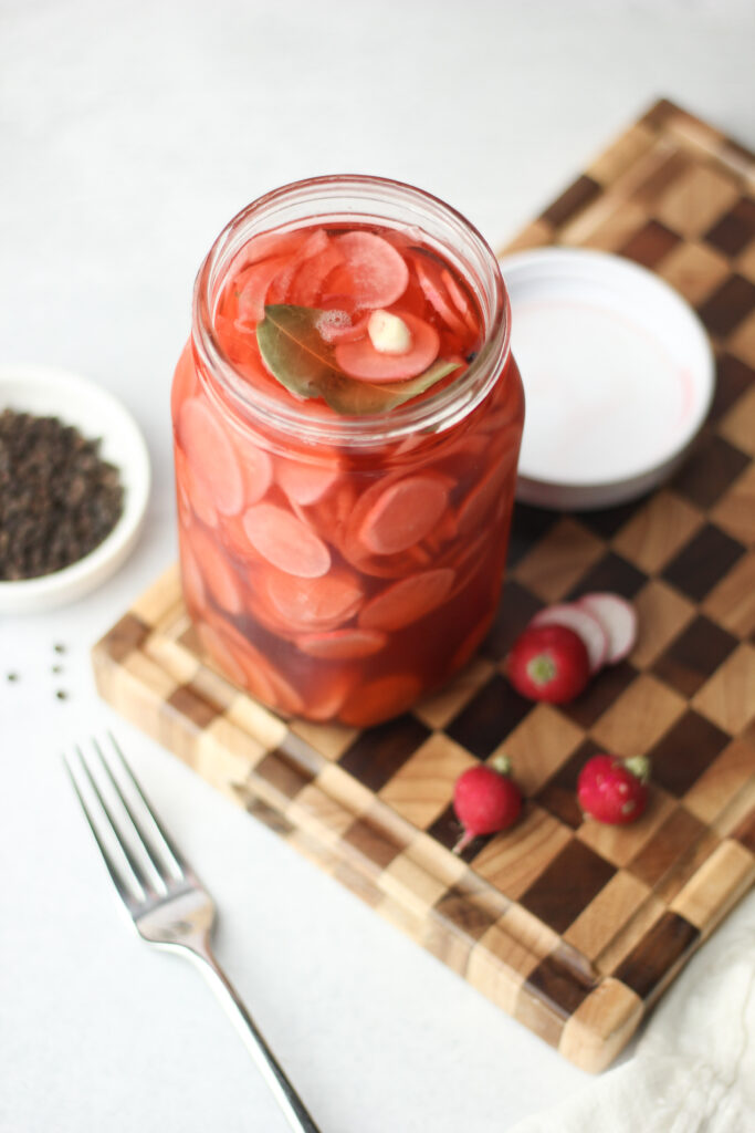 The pickled radishes are in a mason jar and are ready to enjoy!