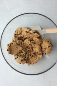 The mini chocolate chips have been mixed into the dough.