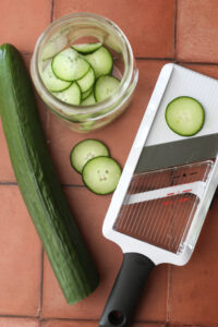 The English cucumber has been thinly sliced with a mandoline.