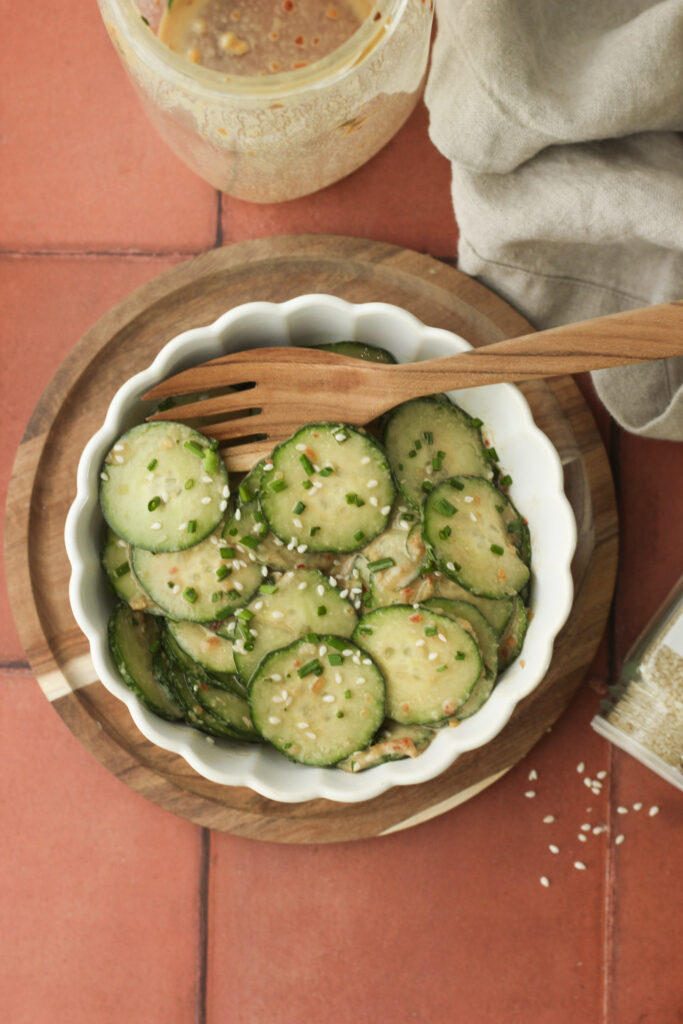 The million-dollar cucumber salad has been added to a bowl and is ready to eat.
