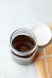 The dressing has been made in a mason jar.