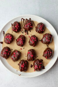 The dates have been sprinkled with crushed freeze-dried raspberries for the final touch.