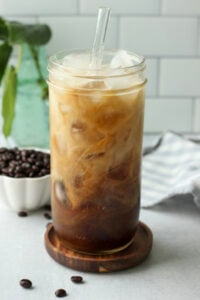 The plant-based milk has been added to the iced coffee.