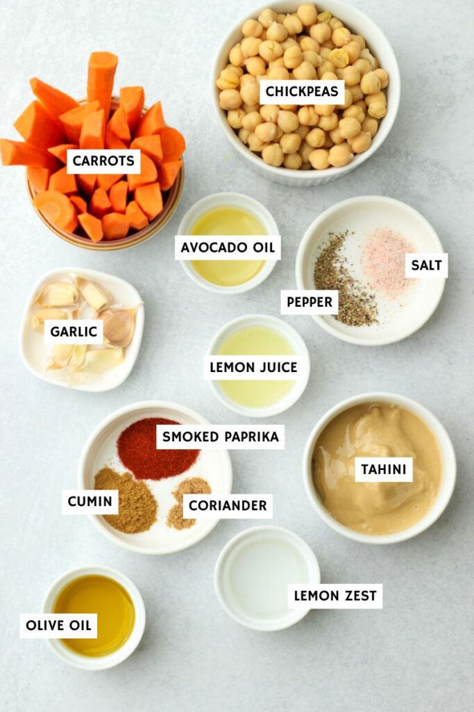 All of the ingredients needed to make this roasted carrot hummus,