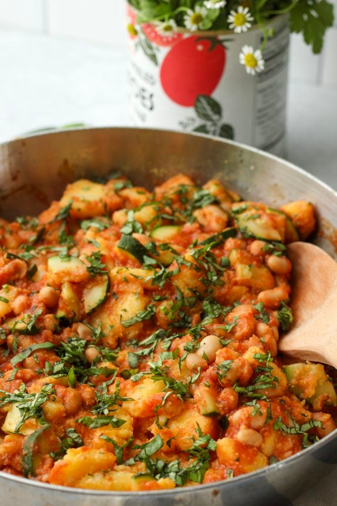 An up-close picture of this prepared polenta dish in a pan.