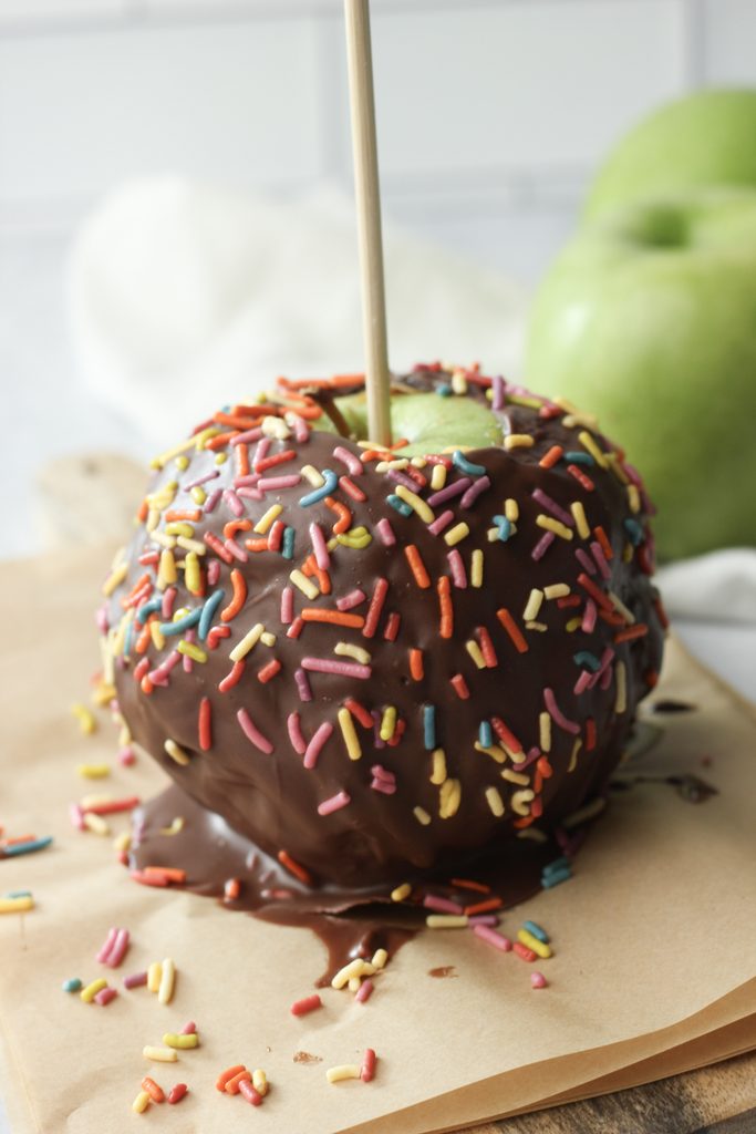The viral date caramel apple has been covered in sprinkles.