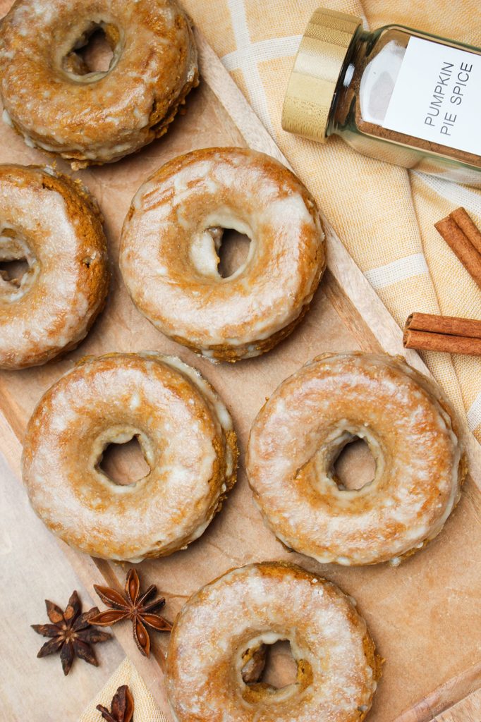 The dairy-free pumpkin donuts are layed out and ready to eat.